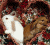 A pixelated contact sheet showing two frames of an animated icon with a cartoon rabbit on the left and green text logo on the right against a dark background.