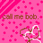 Pink background with scattered pink crosses, diagonal striped pattern in top-left corner, brown text reading 'call me bob.', and intertwined heart shapes at bottom-right.