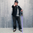A pixelated image shows a person in dark clothing holding a purple lightsaber-like object against a gray background, with blue text reading "I totally want you Jenoris!" on a black field.