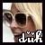 nine identical pixelated images showing a person with blonde hair and sunglasses, each overlaid with the text "duh" in varying colors