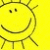 A pixelated yellow circular icon with a simple smiling face, two small dark eyes, and a curved mouth on a solid yellow background.