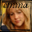 Pixelated static image of a person with light brown hair and closed eyes, set against a warm-toned background with dark text at the top.