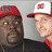 Pixelated image of two people wearing red and white caps with a red logo, one person has text overlay "Rob and" and large white text "BIG" partially visible.