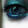 A close-up of a human eye with blue-green irises, dark eyelashes, and pixelated digital distortion across the entire image.
