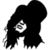 Black silhouette of a figure with long hair and flowing clothing, featuring a white circular emblem on the chest containing a pixelated 'S' symbol.