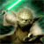 Pixelated image of a character with light-colored hair holding a green lightsaber against a dark green background.