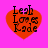 Four identical red hearts on a bright pink background with black text reading "Leah Loves Jade" in three lines.