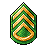 Pixel art icon shaped like a teardrop with green and gold patterns on a gray background.