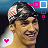 A smiling person wearing a swim cap with an American flag pattern, surrounded by animated pink and white square shapes that change position across frames.