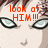 Pixelated close-up of a face with large eyes and red text reading 'look at HIM!!!' overlaid on the image.