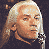 nine pixelated frames showing a person with long light hair transitioning through facial expressions and head movements against a dark background