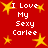 Red background with yellow stars and repeated white text "I Love My Sexy Carlee" in pixelated font.