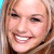 A 50x50 pixel animated contact sheet showing two frames of a celebrity face on the left and green text logo on the right against dark background.