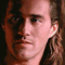 Six pixelated close-up portraits of a man with long brown hair in various poses and backgrounds, arranged in two