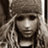Pixelated grayscale image of a person with long hair and a headband, next to pixelated text reading 'wanna get dirty <3' on a black background.