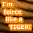 Orange rectangular text blocks with white pixelated letters spell out 'I'm feirce like a TIGER!' over a brown pixelated background.