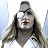 A 48x48 pixel animated buddy icon featuring a split composition with a woman on the left and bold yellow text on black background on the right, part of an animation sequence.