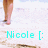 Pixelated image of a person's legs in brown shoes and pink socks standing on a light background with cyan text reading "Nicole [:".