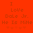 Red background with brown pixelated text reading "I Love Dole Jr. He Is Mine" and four small star symbols below.