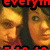 Pixelated image with red text at top and bottom, two faces in warm tones, dark vertical line dividing composition.