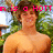 Pixelated image of a shirtless person with brown hair against a green and blue background, overlaid with pink text reading 'n is a HOTT'.