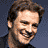 A 4-frame contact sheet of a pixelated animated icon featuring three different smiling Colin Firth character portraits with "Coolbuddy.com" text on the right frame.