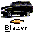 Pixelated black Chevrolet Blazer vehicle with orange Chevrolet bowtie logo and 'Blazer' text below on gray background.
