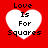 Red background with four white heart shapes, each containing black text reading "Love Is For Squares" in pixelated font.