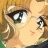 A pixelated anime-style character face with blonde hair and green eyes on the left, next to a black background with white text reading "Anime IM" above smaller stylized text "c0m" on the right.