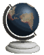 A globe on a stand rotates through multiple views showing different continents against a gray background.