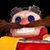 Pixelated character with large blue eyes, pink nose, brown mustache, and red shirt against black background.