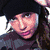 five pixelated images showing a person in various poses and text elements including "Tom Kaulitz" and "Is Perfect"
