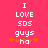 Pixelated text on a solid pink background with orange star-like symbols below the last line.