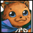 Pixelated cartoon animal with large blue eyes, orange fur, and a small smile, wearing a blue and green garment with white trim.