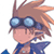 Pixelated cartoon character with brown hair, goggles, and blue outfit on white background.