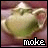 Animated icon of a teapot with green and beige tones, showing text changes from 'moke' to 'o.' to 'wish' and heart symbol variations.