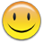 Static yellow smiley face icon with black eyes and mouth, orange gradient top edge, pixelated rendering on white background.