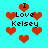 Pixelated cyan background with red hearts and black text reading "I Love Kelsey" in multiple arrangements.