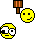 A 2x2 contact sheet of four animated AIM buddy icons featuring yellow smiley faces with various expressions and brown hammers, displayed on a gray background.