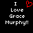 Black background with white pixelated text reading "I Love Grace Murphy!!" and a red heart symbol replacing the word "Love" in one view.
