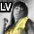 A pixelated image of a person with dark hair and yellow clothing, featuring text overlays in different positions