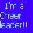 Pixelated blue background with white text reading "I'm a cheerleader!!" in a blocky, retro digital style.