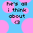 Pixelated text on a blue background with pink circles, showing 'he's all i think about' and a heart symbol.