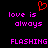 Red pixelated heart symbol above pink text reading 'love is always flashing' on black background.