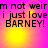 Pixelated text on a pink and yellow gradient background with four identical showing 'm not weirm i just love BARNEY!' in black block letters