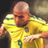Static 48x48 pixel icon of a bald man in a yellow sports jersey with green accents, cropped to show upper body and arms against dark background.