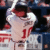 A pixelated animated image shows a baseball player in a white uniform with red accents and the number 10, transitioning to a dark blue jersey with 'C. JONES' and number 10.