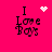 A bright pink background displays the text "I Love Boys" in black pixelated letters with a white heart symbol above the text in the top-left corner.