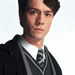 16 showing a person in school uniform with changing background colors and text overlays