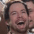 A pixelated image shows a person with dark hair and light skin laughing, next to blue background text reading 'David Cook' with a play button symbol.
